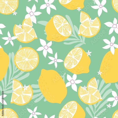Fruit seamless pattern, lemons with tropical leaves and flowers on green background. Summer vibrant design. Exotic tropical fruit. Colorful vector illustration
