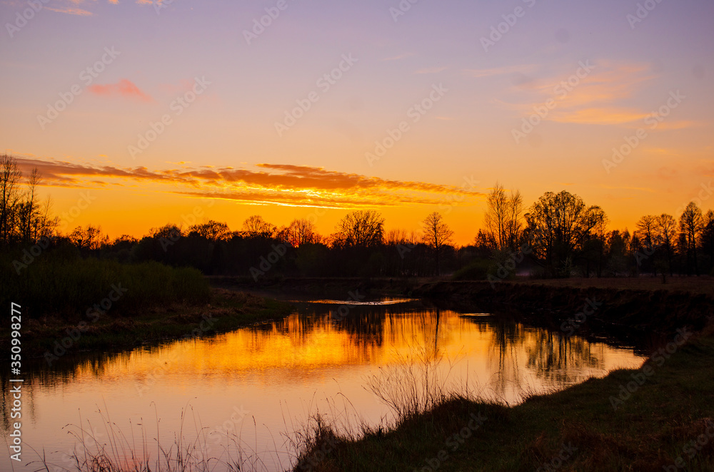 Fototapeta premium sunset over the river