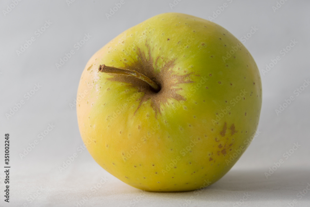 Simple green apple on white isolated background