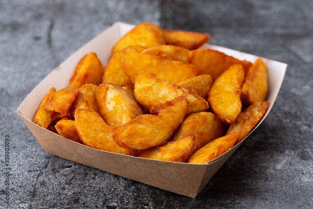 .french fries in disposable dishes .french fries in disposable dishes