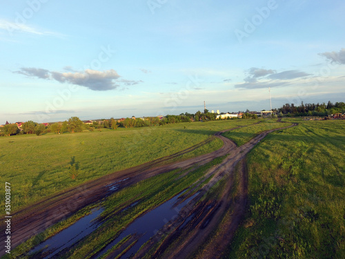 Aerial view of the saburb landscape  drone image . Near Kiev. Sunset time.