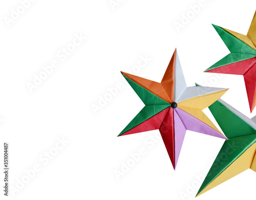 Closeup of origami christmas stars isolated white