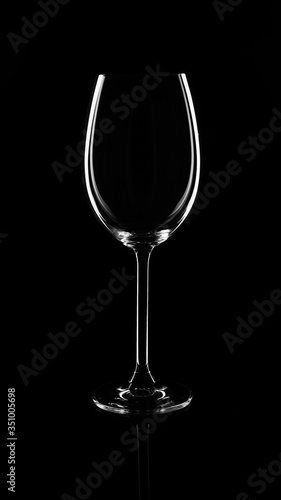 white wine glass on a dark background