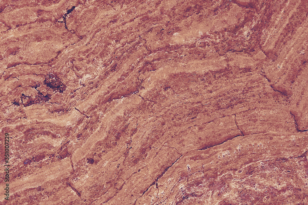 Obraz premium Red marble stone background pattern or texture. Onyx texture of natural stone. Surface of the marble with red tint.