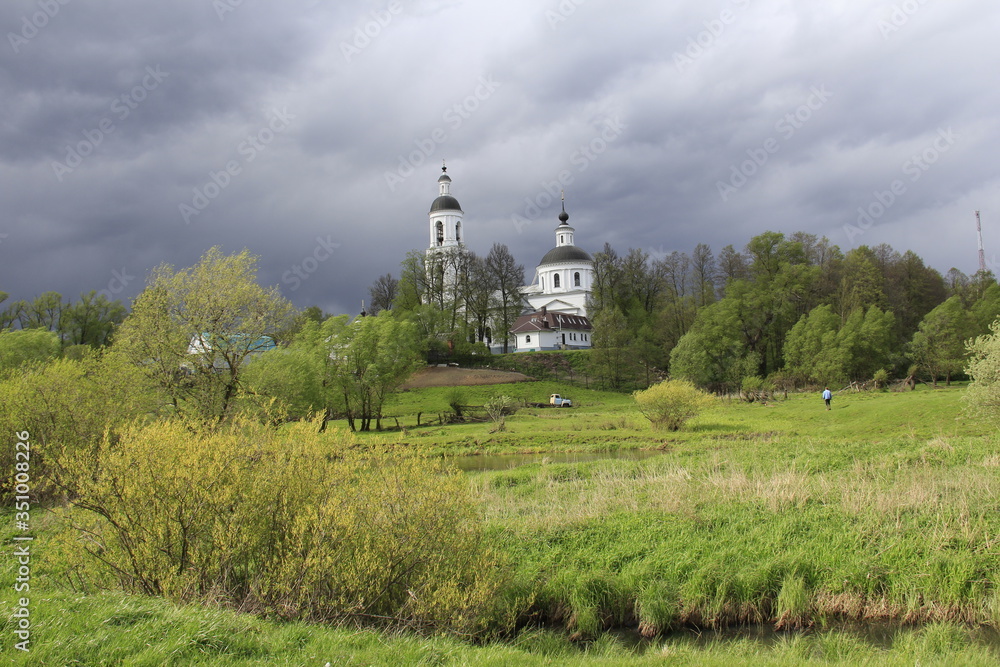 Landscape with church in Russian village