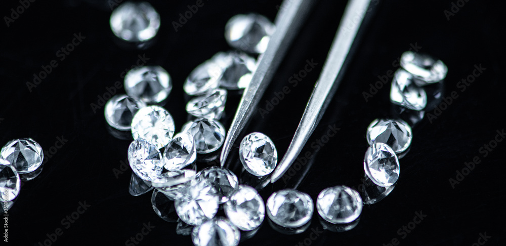 Small Diamonds on dark background (close up shot; selective focus) Small Diamonds on dark background (close up shot; selective focus)