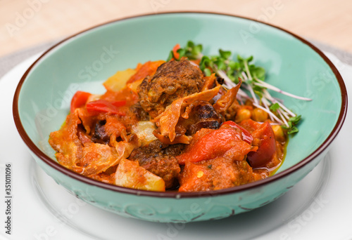 Beef balls with vegetables and tomato sauce