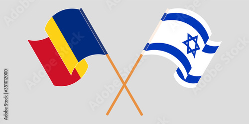 Crossed and waving flags of Romania and Israel