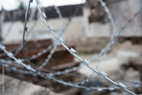 Close-up of barbed wire. Concept of restriction of freedom. Background, texture. photo