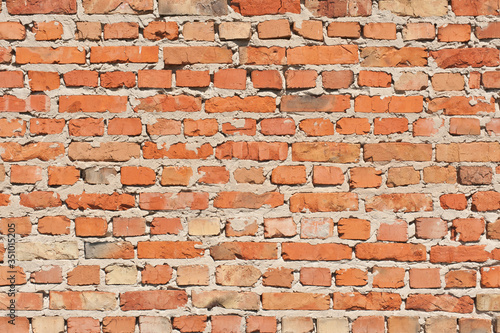 Bright textured brick wall
