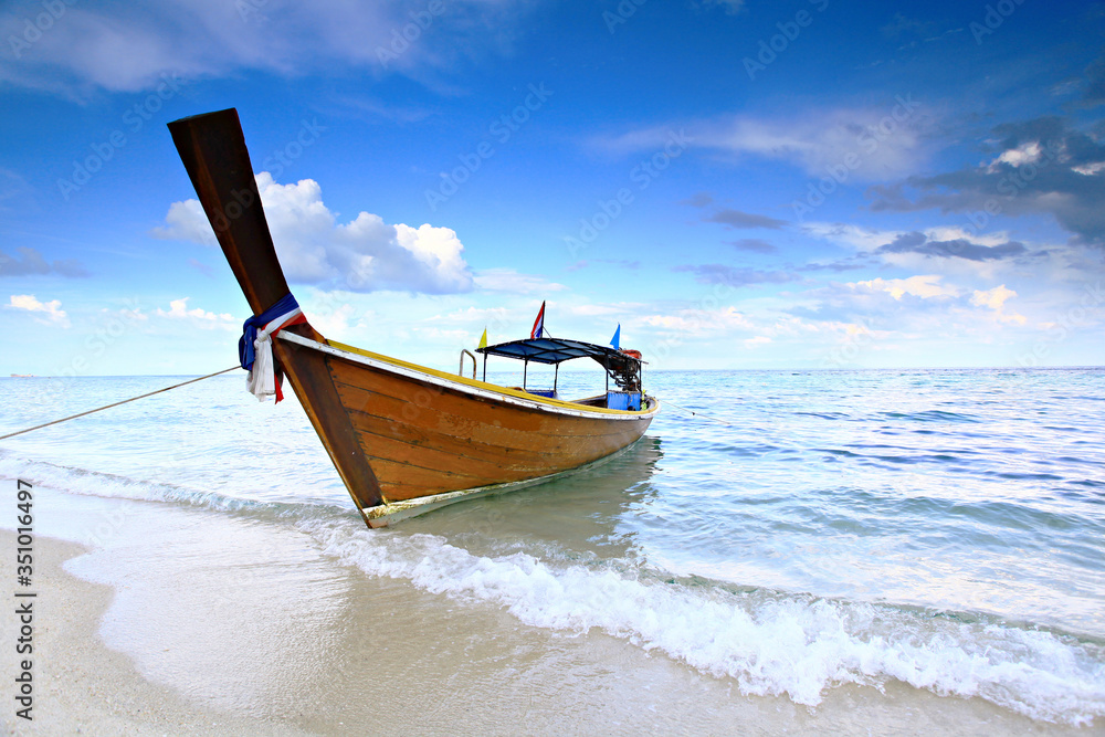 Longboats and scenic view on Koh Lipe beach Andaman Sea, Satun province, Thailand Longboats and scenic view on Koh Lipe beach Andaman Sea, Satun province, Thailand