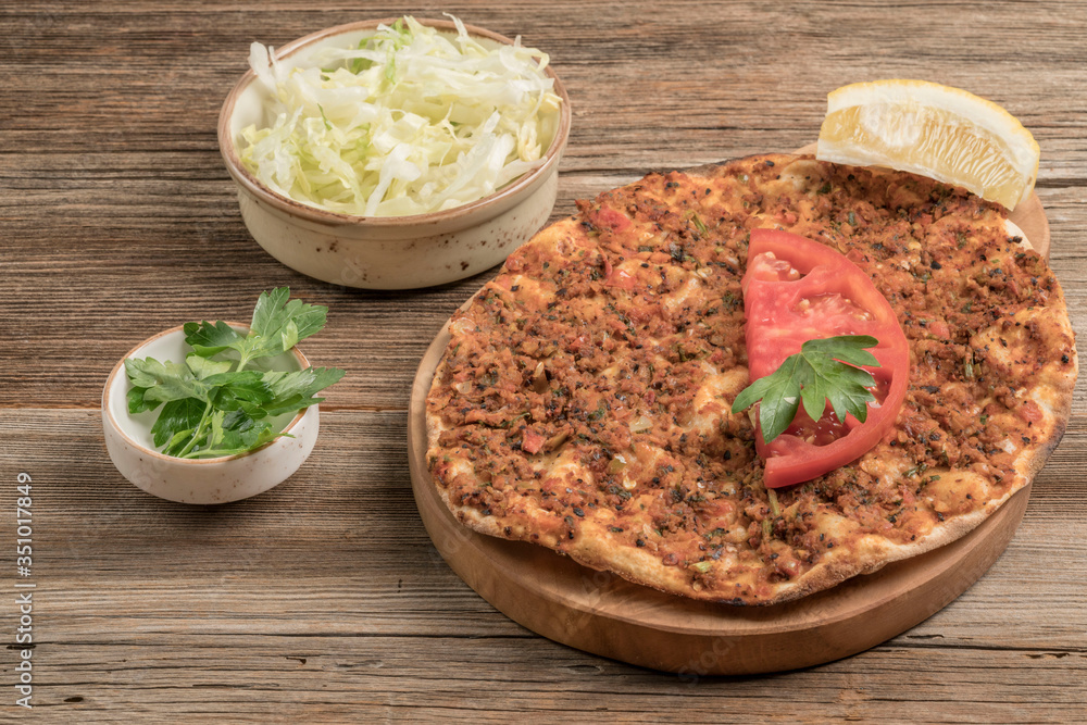 Turkish pizza, made of ground beef and onion Turkish pizza, made of ground beef and onion