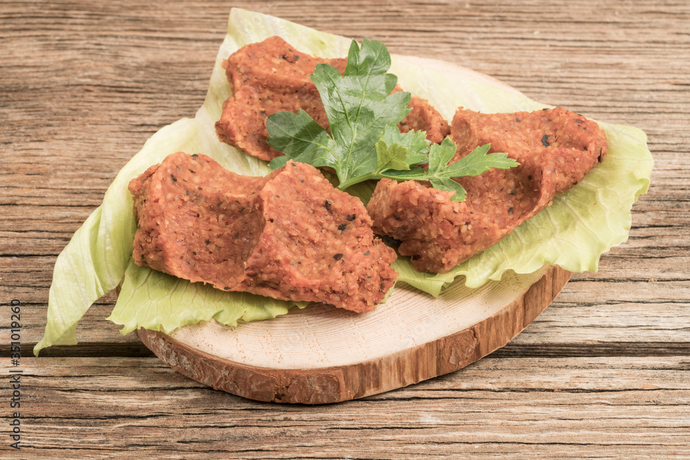 Turkish appetizer made of raw minced meat and spices Turkish appetizer made of raw minced meat and spices