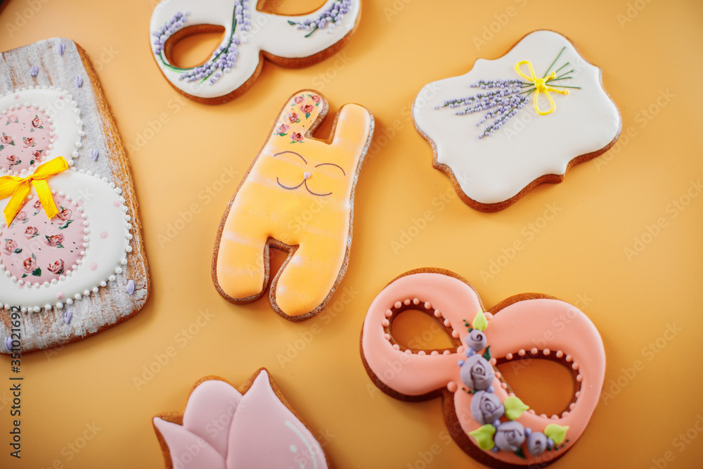 gingerbread cookies with different shapes on a yellow background gingerbread cookies with different shapes on a yellow background