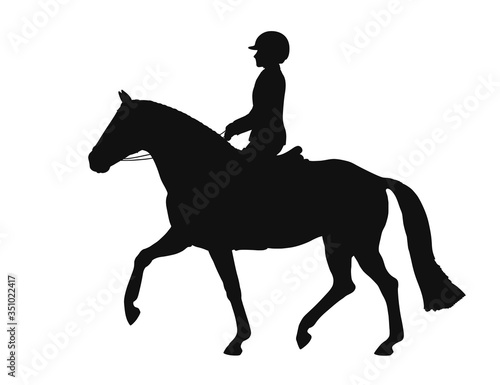 Silhouette of a sport riding pony and young athlete trotting