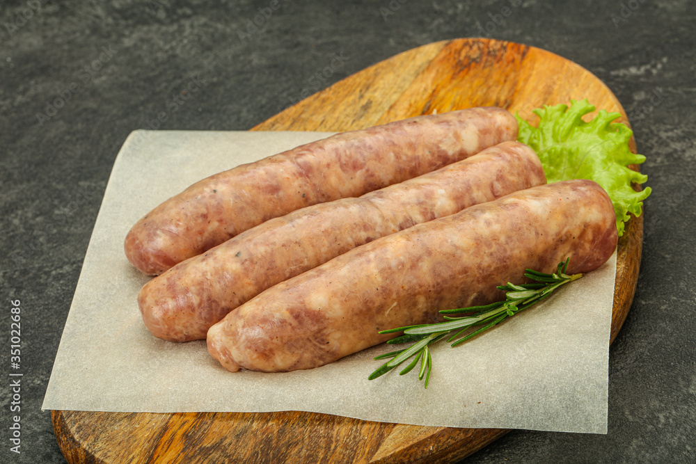 Raw pork meat sausages for grill Raw pork meat sausages for grill