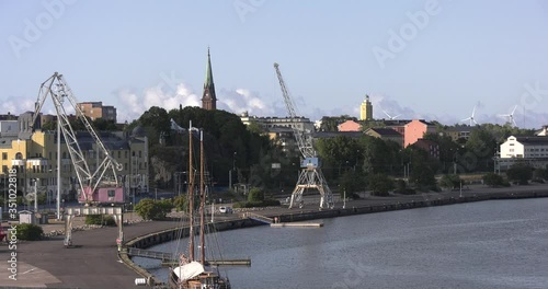 4K Baltic Sea Finnish Bay lagoon summer morning harbour video, Kotka port and town over calm water channel in Finland, northern Europe photo