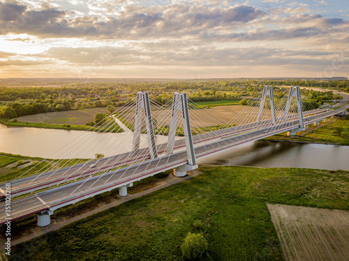 Bridge of Cardinal Franciszek Macharski in Krakow at sunset.