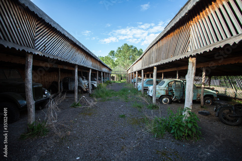 cemetery of old abandoned Soviet cars. in an abandoned Parking lot © Влад Астанин