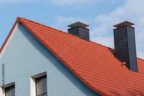 red roof with chimney