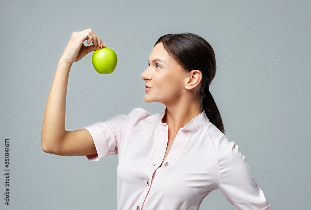 a girl with a ripe green apple a girl with a ripe green apple