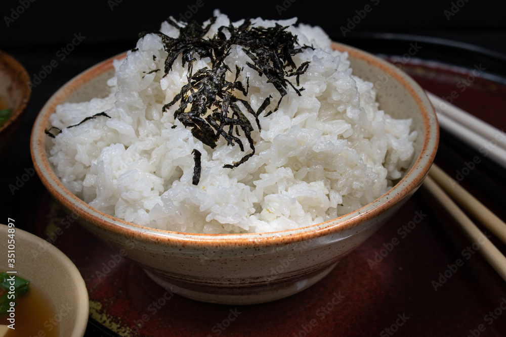 Japanese rice bowl topped with shredded seaweed Japanese rice bowl topped with shredded seaweed