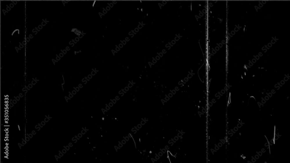 Analogue noise, grain. Film burn and light leaks effects. Dust and