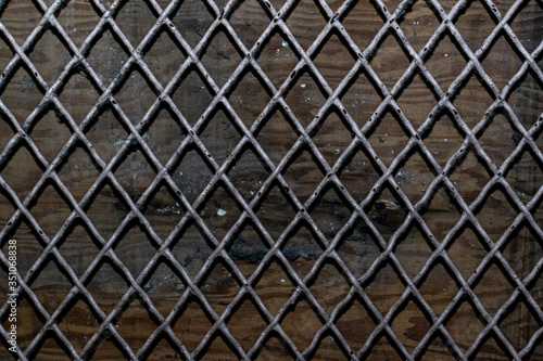 metal grid background old jail