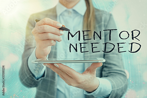 Photos Text sign showing Mentor Needed