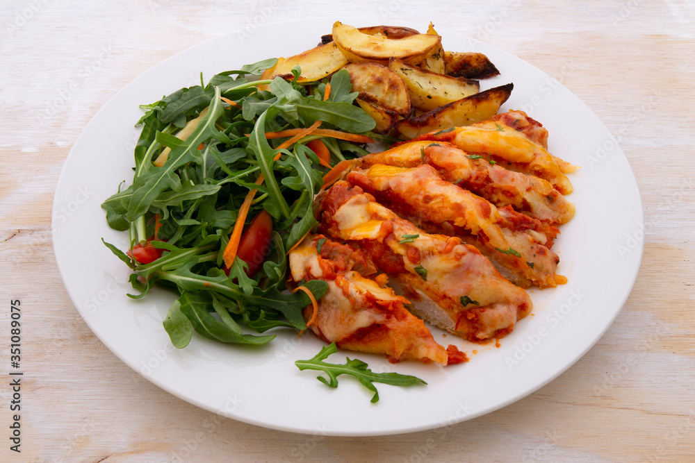 Chicken Parmesan Baked in Tomato Sauce with cheese, chips Chicken Parmesan Baked in Tomato Sauce with cheese, chips
