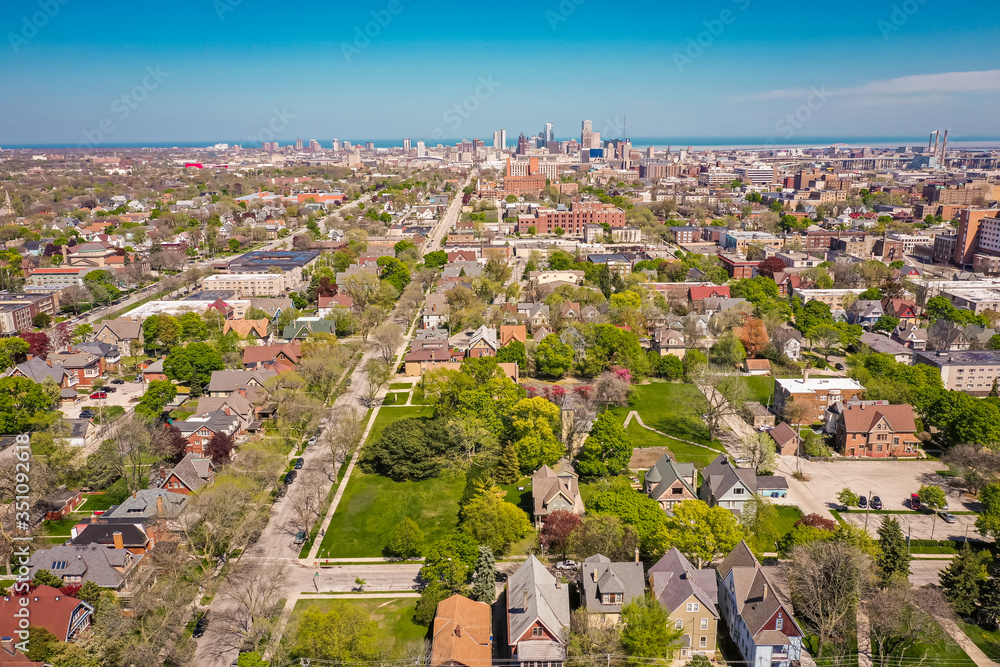 Milwaukee, WI / USA - May 20, 2020:  Aerial view of Milwaukee, Wisconsin looking east towards Downtown from approximately the 3200 block of West State Street.