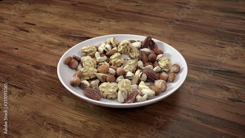 Mixed Nuts in White Bowl on Wooden Table.