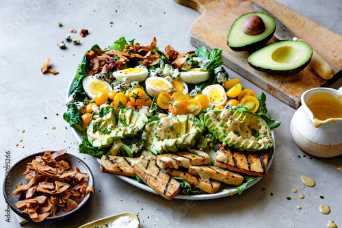 Vegetarian cobb salad with mustard dressing. photo