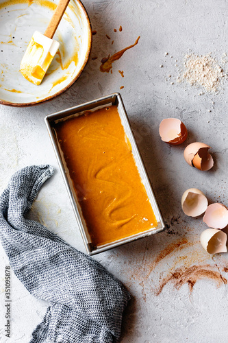 Pumkin bread batter in a baking pan. photo