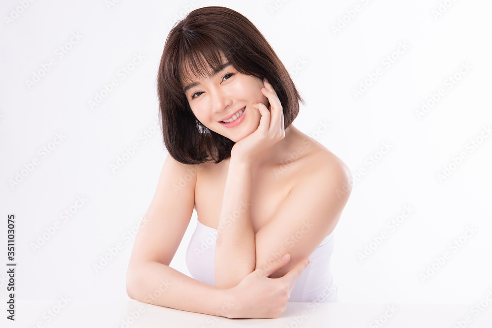 Beautiful Young Asian Woman touching her clean face with fresh Healthy Skin, isolated on white background, Beauty Cosmetics and Facial treatment Concept Beautiful Young Asian Woman touching her clean face with fresh Healthy Skin, isolated on white background, Beauty Cosmetics and Facial treatment Concept
