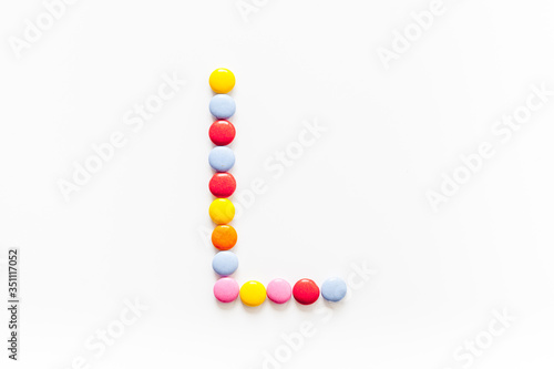 Candies font alphabet. Letter L isolated top view