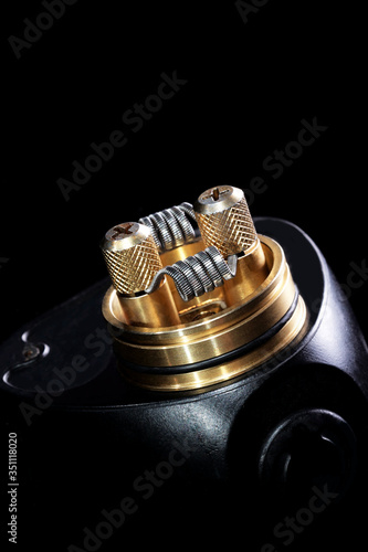 Rda recoil for vapor isolated on black before wicking close up with space