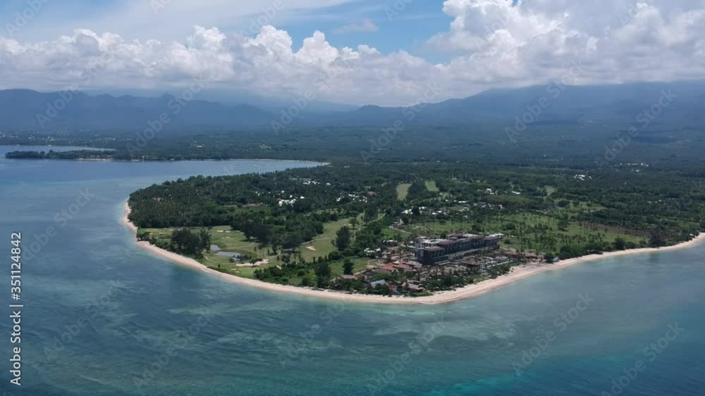 drone flies to the lombok indonesia peninsula with mountains in the clouds in sunny weather drone flies to the lombok indonesia peninsula with mountains in the clouds in sunny weather