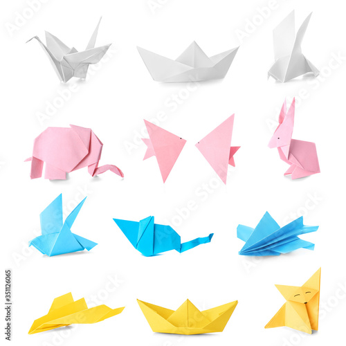Fototapeta Naklejka Na Ścianę i Meble -  Many origami figures on white background