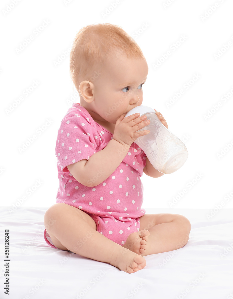 Cute little baby with bottle of milk on white background Cute little baby with bottle of milk on white background