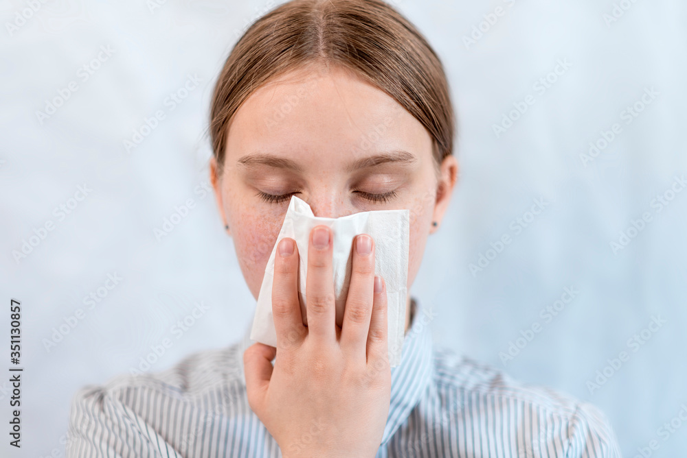 teenager girl, coughing up paper pulp, feeling unwell, sore throat temperature, cautious virus disease and flu chills orvy disease, stay home, stop pandemic of coronovirus covid 19. teenager girl, coughing up paper pulp, feeling unwell, sore throat temperature, cautious virus disease and flu chills orvy disease, stay home, stop pandemic of coronovirus covid 19.