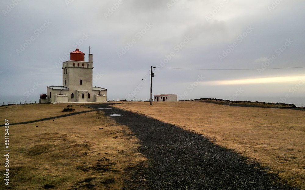 A lighthouse in Dyrholaey on the south coast of Iceland