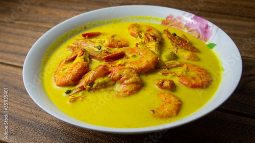 Authentic Malay dish known as Udang masak lemak or Prawn cooked with coconut milk