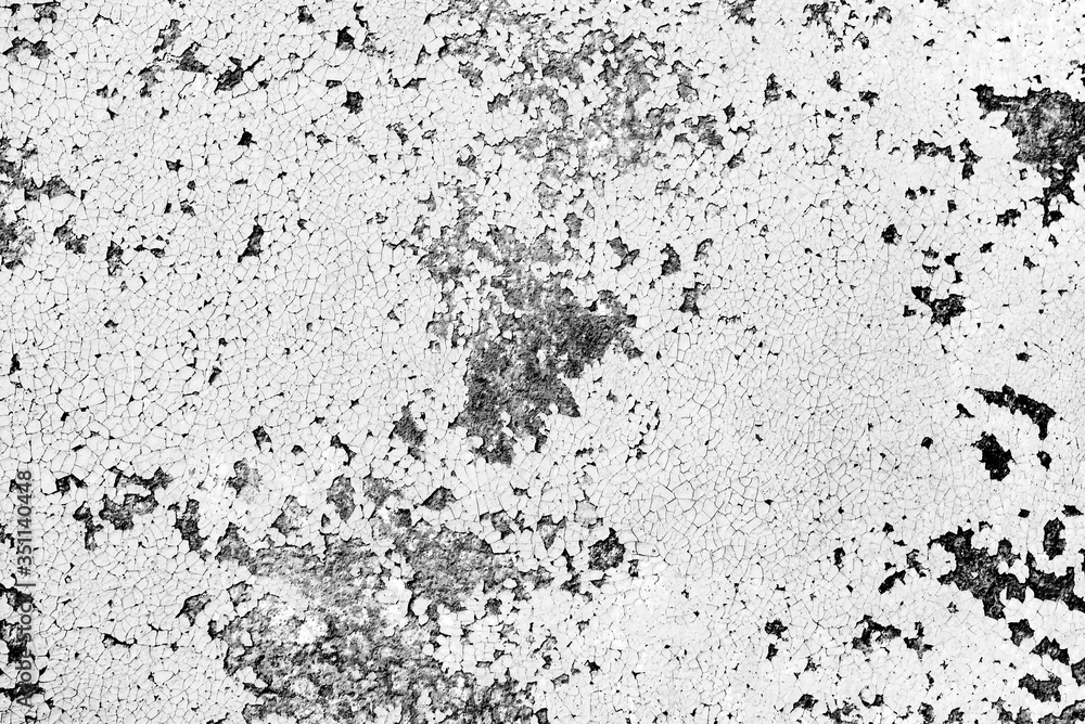 Texture of a concrete wall with cracks and scratches which can be used as a background Texture of a concrete wall with cracks and scratches which can be used as a background