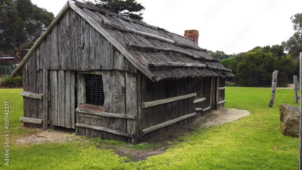 Old historical wooden cabin in the city of Melbourne, first settlers in Australia Old historical wooden cabin in the city of Melbourne, first settlers in Australia