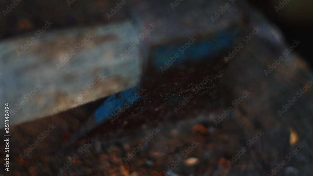Slow Motion BRoll Clip of an old axe Slow Motion BRoll Clip of an old axe