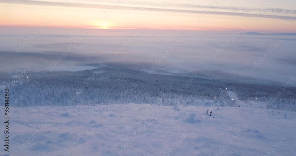 Sunset in Lapland FInland in the middle of winter during Christmas Sunset in Lapland FInland in the middle of winter during Christmas