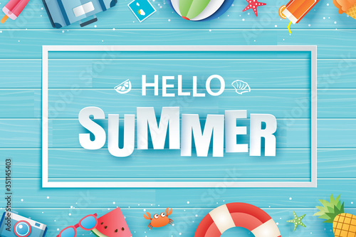 Hello summer with decoration origami on blue wooden background. Paper art and craft style.