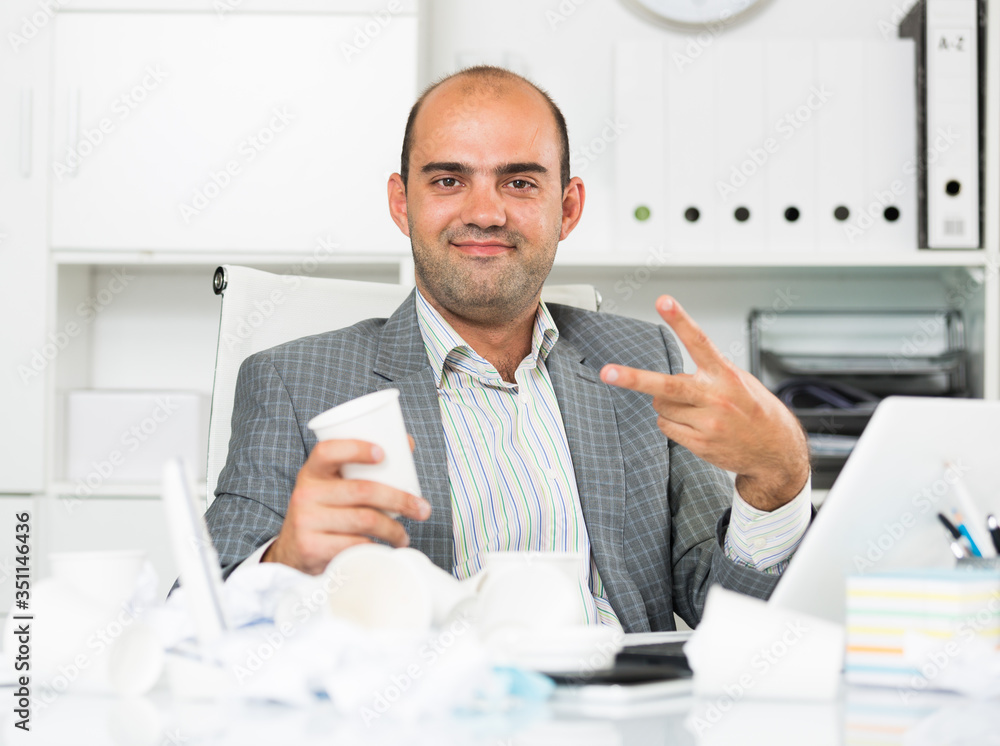 Portrait of smiling man joying in the office