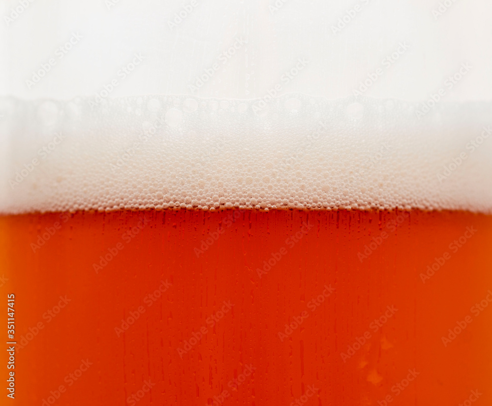 misted glass with beer bubbles misted glass with beer bubbles